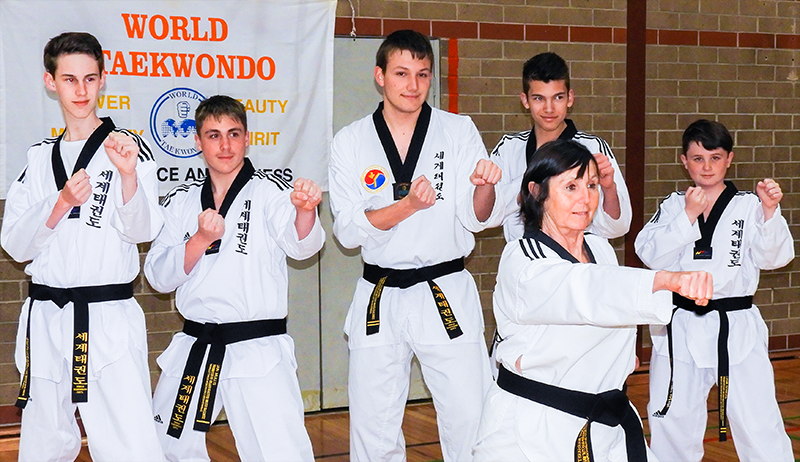 World Taekwondo Black Belts with Instructor Margaret